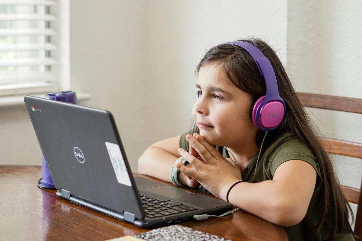 Child learning online with Mecca Global Academy
